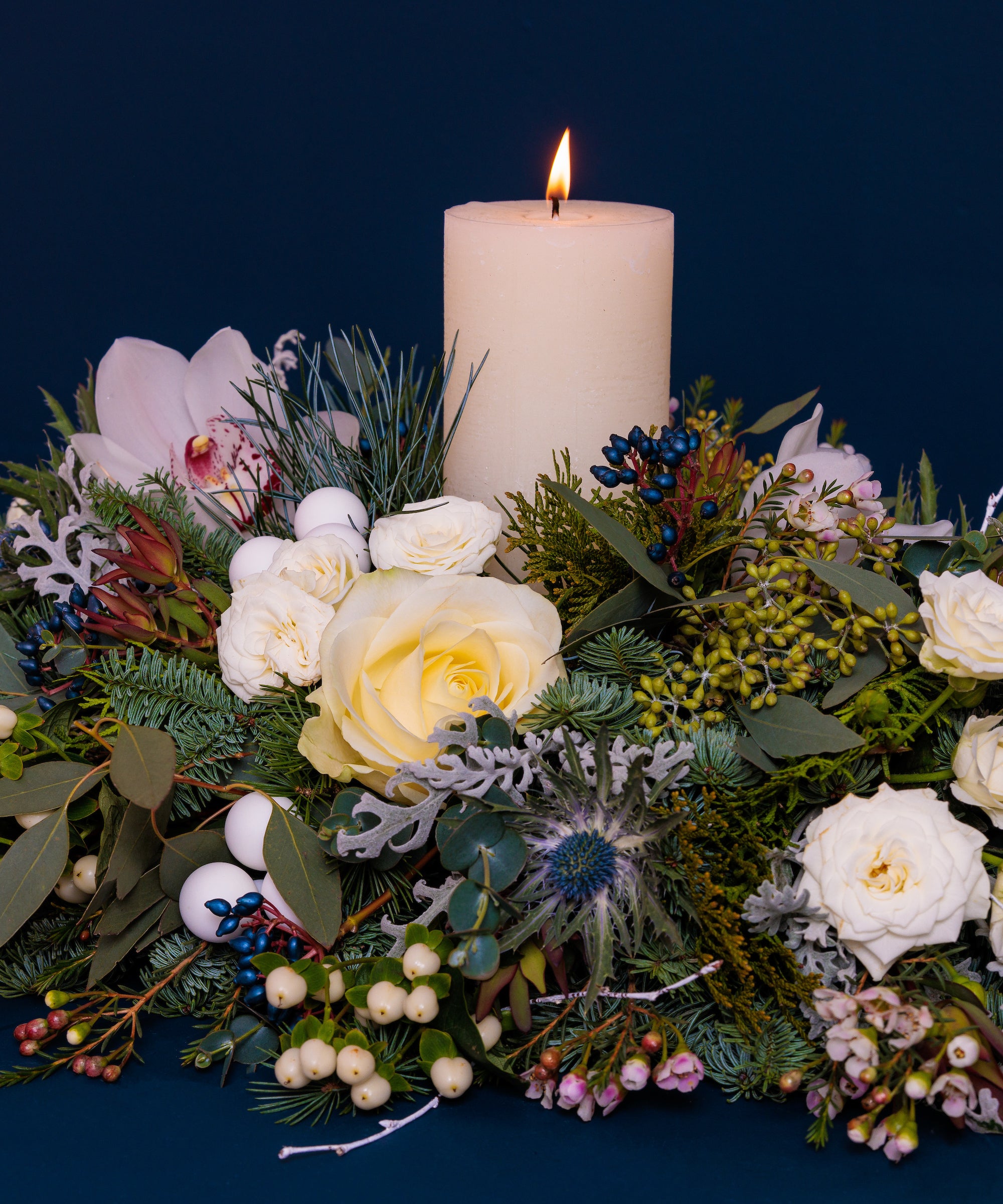 Christmas Dinner Table Arrangement with Ivory Candle