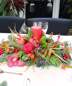Christmas Dinner Table Arrangement with Red Candle