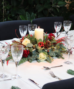 Christmas Dinner Table Arrangement with Ivory Candle